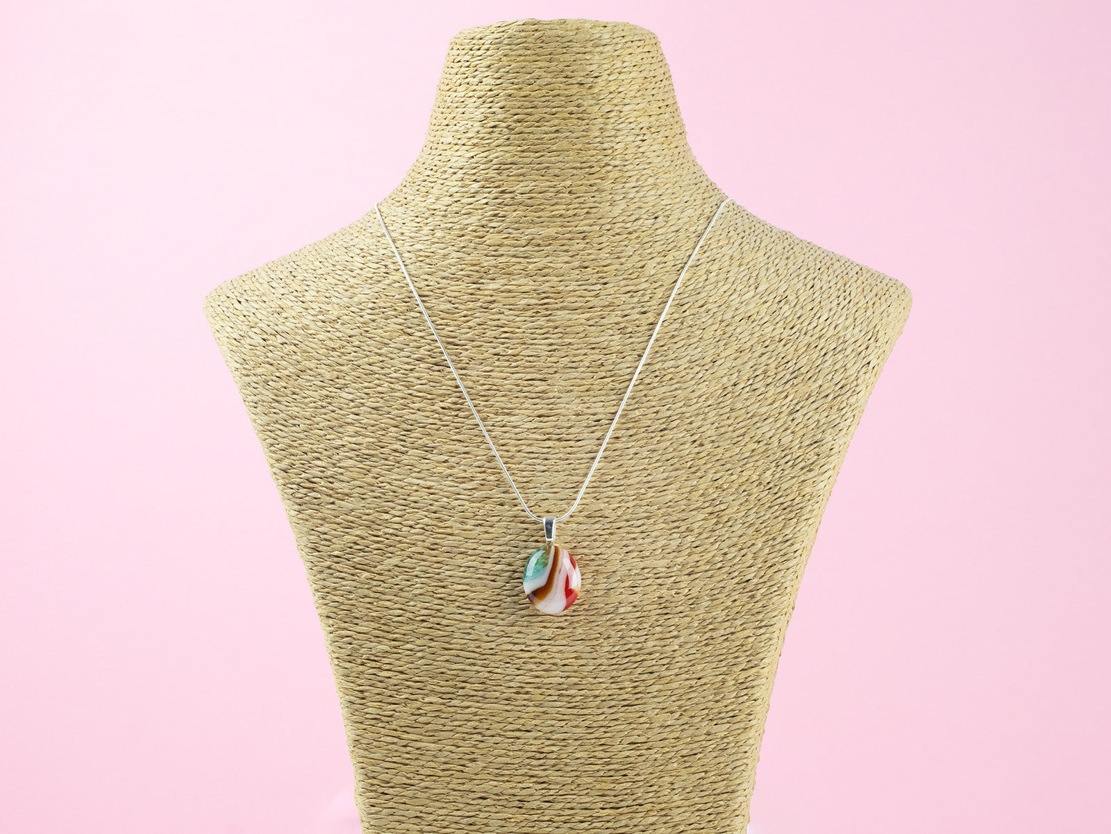 Fused glass pendant necklace, handmade in sea greens and rose pinks, hung on sterling silver chain. 