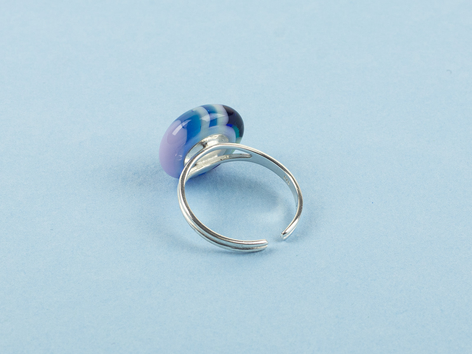 Silver detailing on Fused glass pendant sterling silver ring, handmade in coastal blues. 