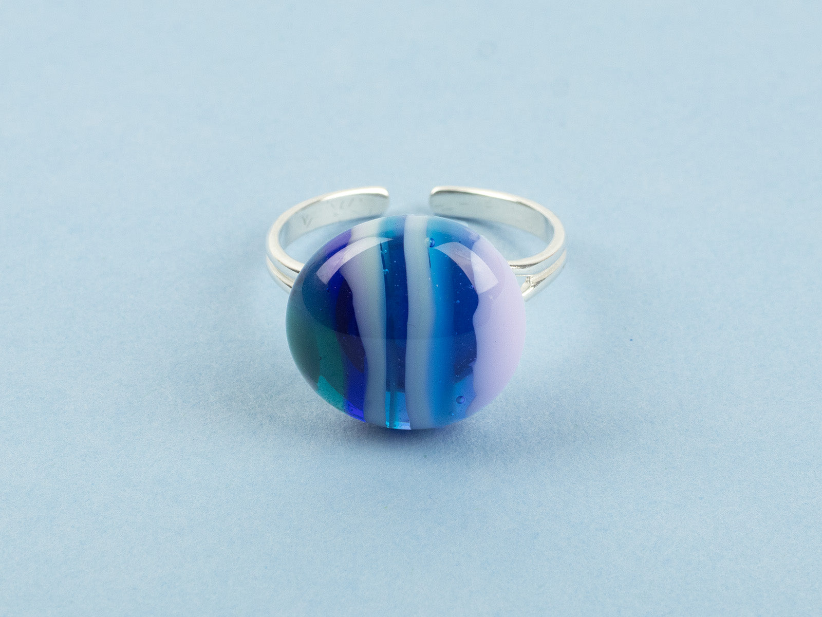 Details of fused glass pendant sterling silver ring, handmade in coastal blues. 
