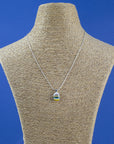 Fused glass pendant necklace, handmade in soft coastal colours, hung on sterling silver chain. 