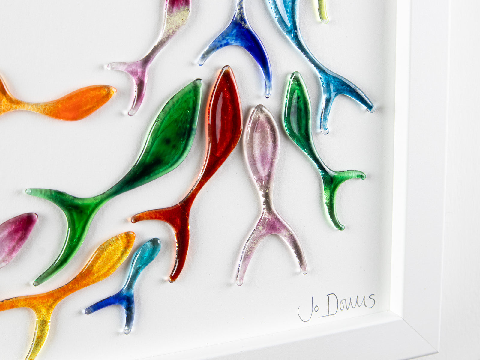 Ocean inspired art frame, made from fused glass, in rainbow colours. Hand-made in Cornwall, Launceston. 