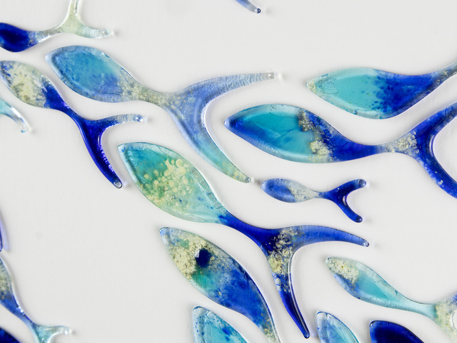 Ocean inspired art frame, made with fused glass fish in marine blue colours. Hand-made in Cornwall, Launceston. 