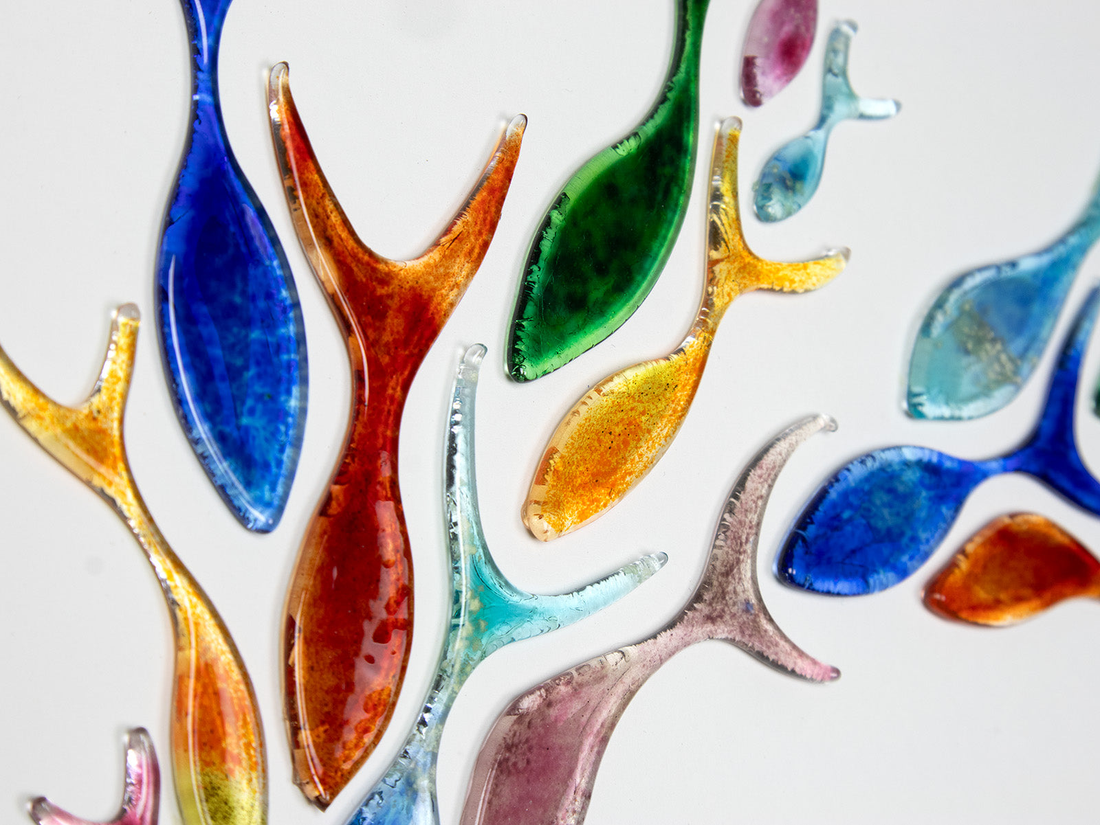Ocean inspired art frame, made from fused glass, in rainbow colours. Hand-made in Cornwall. 