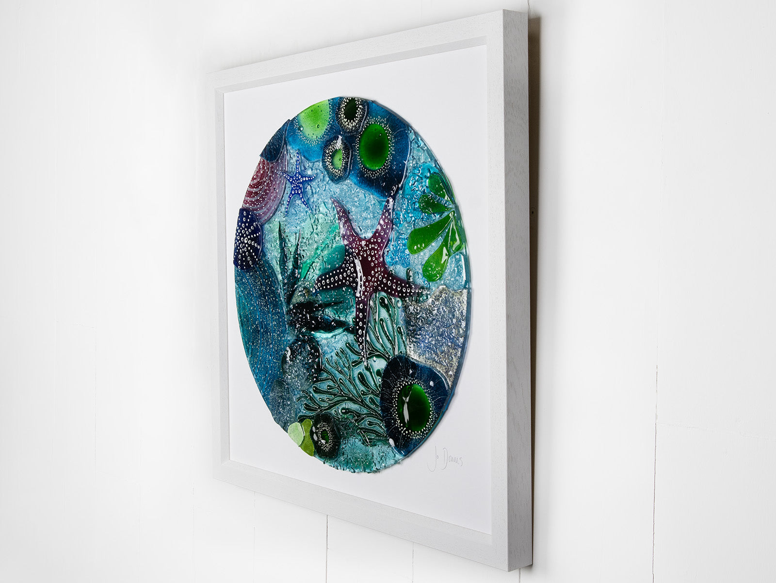 Side image of a fused glass extra large art frame, ocean reef inspired with coastal colours and texture.