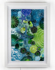 Intricate ocean reef inspired fused glass art frame. Bright ocean blue colours and handmade wall art. 