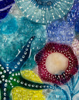 Close up of intricate ocean reef inspired fused glass art frame. A vibrant and handmade piece of wall art. 