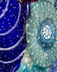 Close up of intricate ocean reef inspired fused glass art frame. A vibrant and handmade piece of wall art. 