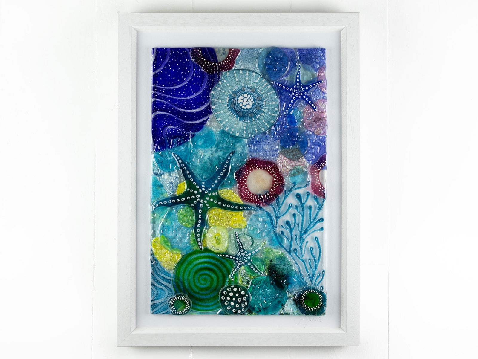 Intricate ocean reef inspired fused glass art frame. A vibrant and handmade piece of wall art. 