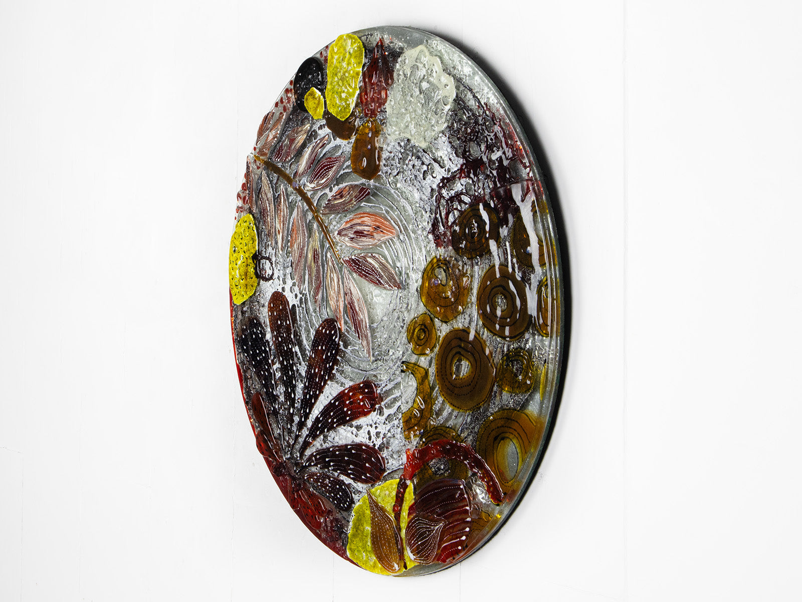 Fused glass round wall panel, made from fused glass, inspired by the autumnal country-side. Striking, handmade wall art with organic texture. 