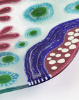 Fused glass round dish, with hand painted design inspired by the ocean reefs in bright colours. 