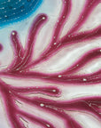 Details of fused glass round dish, with hand painted design inspired by the ocean reefs in bright colours. 