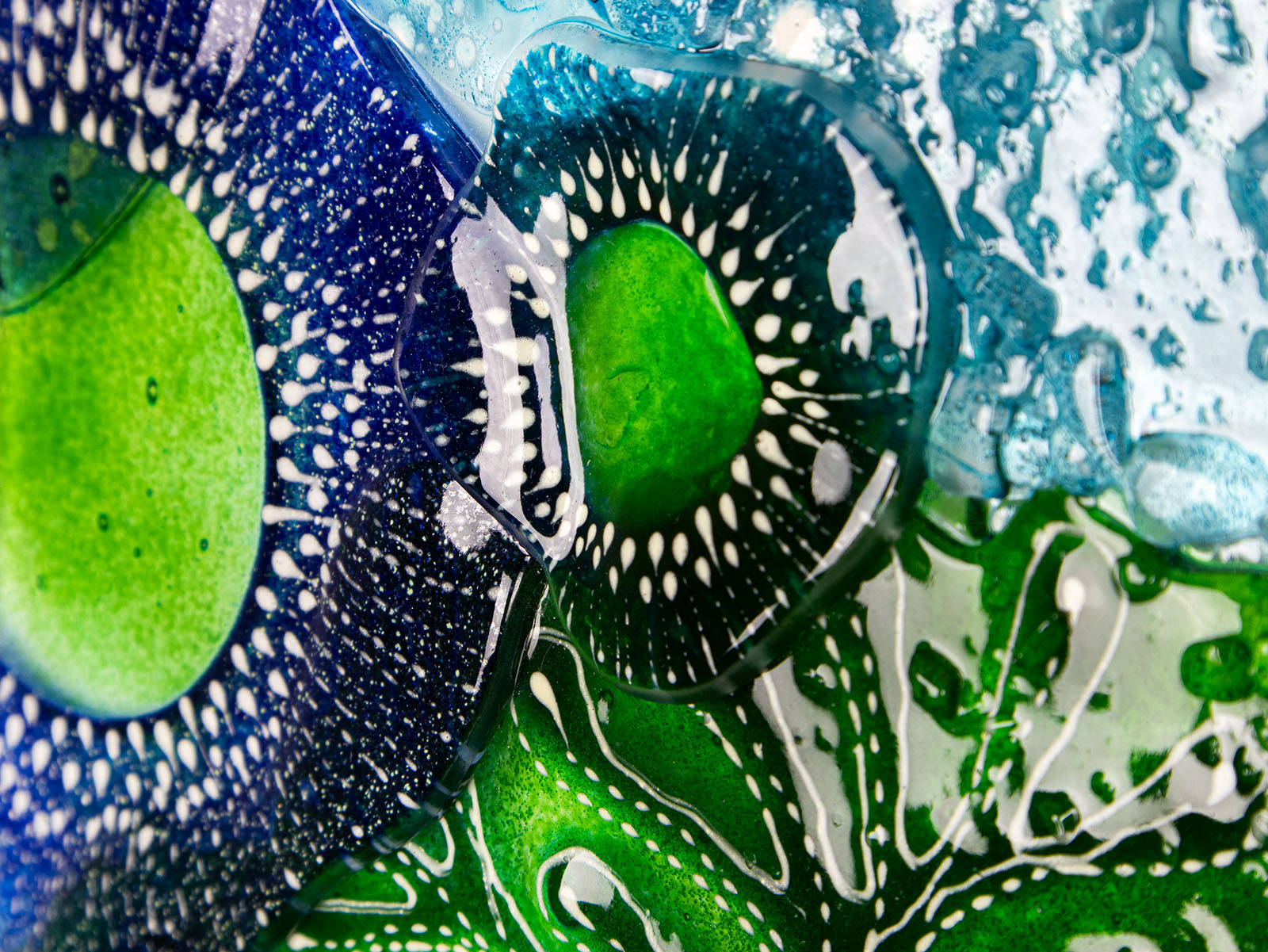 Image of details in fused glass art frame, inspired by the ocean with bright coastal colours. Beautiful wall art, hand-made in Cornwall, Launceston. 