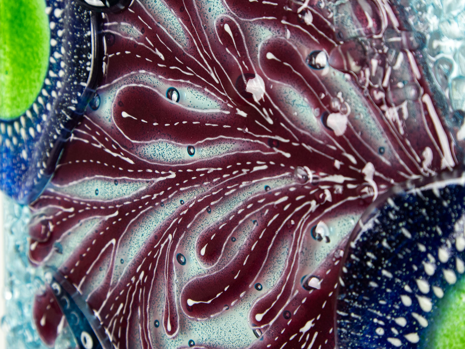 Close up of coral in fused glass art frame inspired by the ocean, created with texture and coastal colours with pink hues. A unique piece of wall art, handmade in Cornwall, Launceston. 