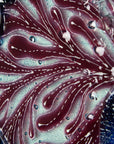 Close up of coral in fused glass art frame inspired by the ocean, created with texture and coastal colours with pink hues. A unique piece of wall art, handmade in Cornwall, Launceston. 