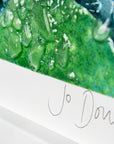Signature on fused glass art frame, inspired by the ocean with lots of texture and bright coastal colours. A unique piece of wall art, handmade in Cornwall, Launceston. 