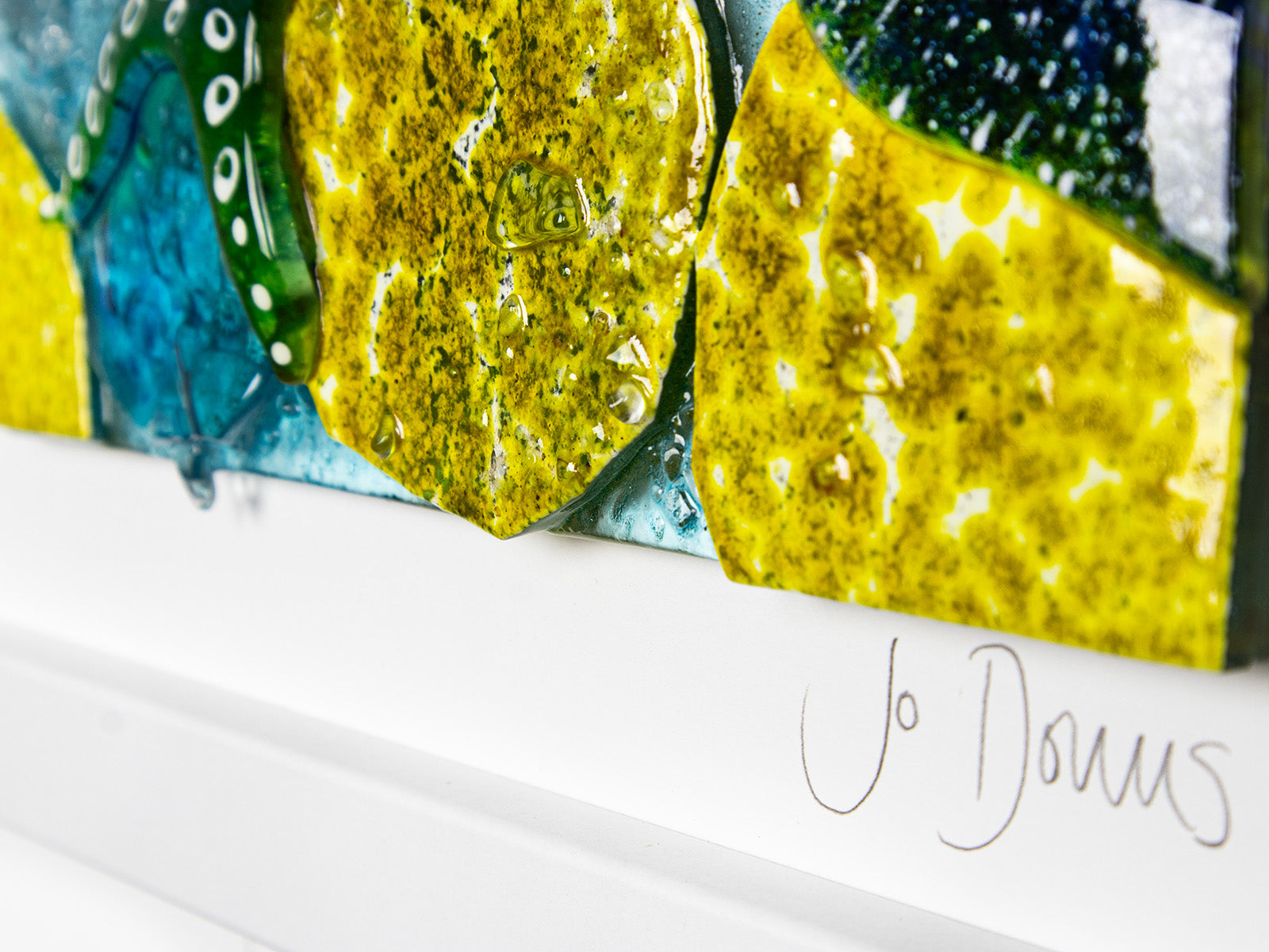 Signature shot in for Summer Cove fused glass art frame, inspired by the ocean with bright coastal colours. Beautiful wall art, hand-made in Cornwall, Launceston. 