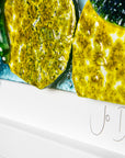 Signature shot in for Summer Cove fused glass art frame, inspired by the ocean with bright coastal colours. Beautiful wall art, hand-made in Cornwall, Launceston. 