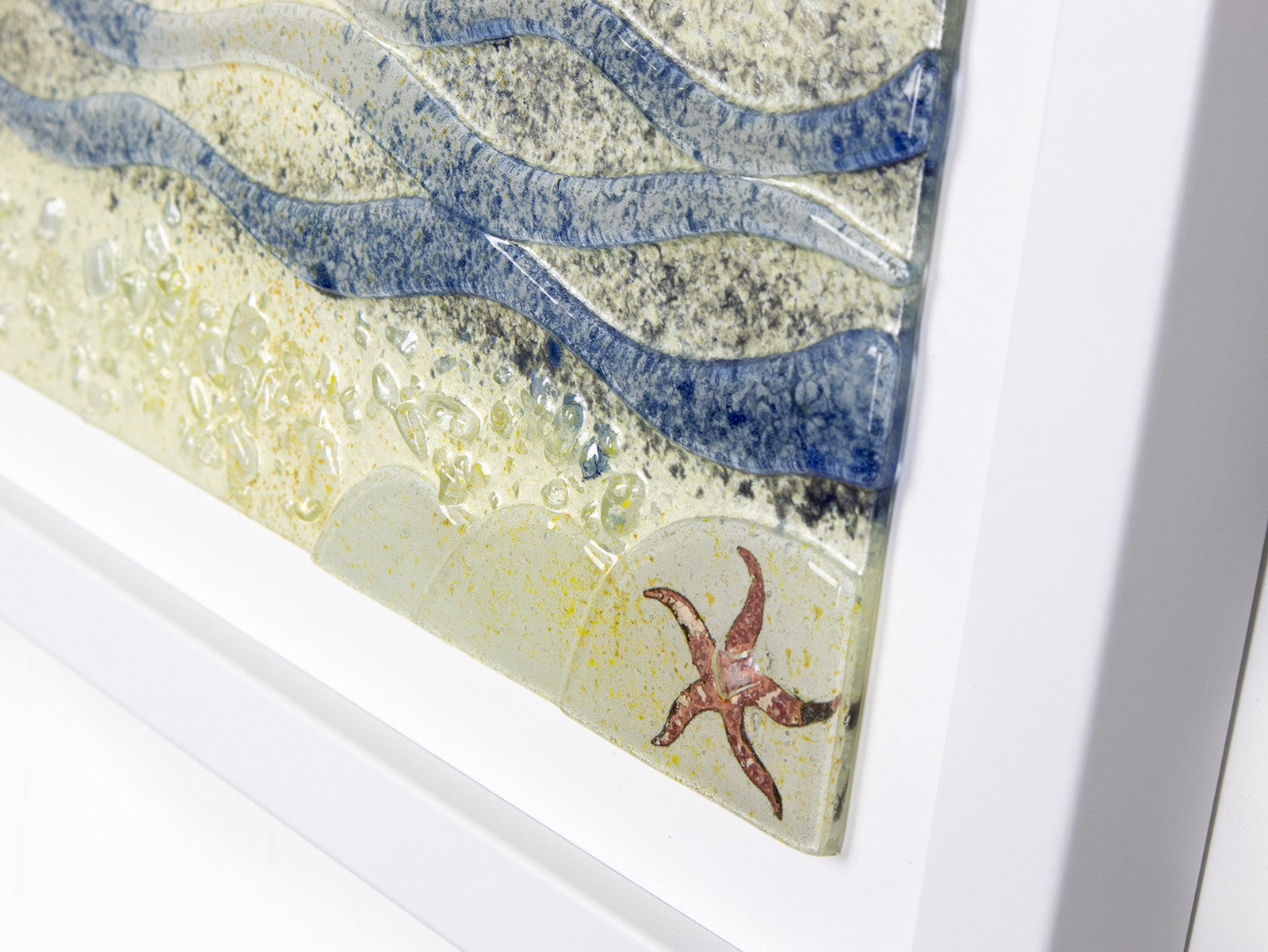 Fused glass large art frame inspired by a sunrise on the coast. Handmade wall art with textural detailing. 