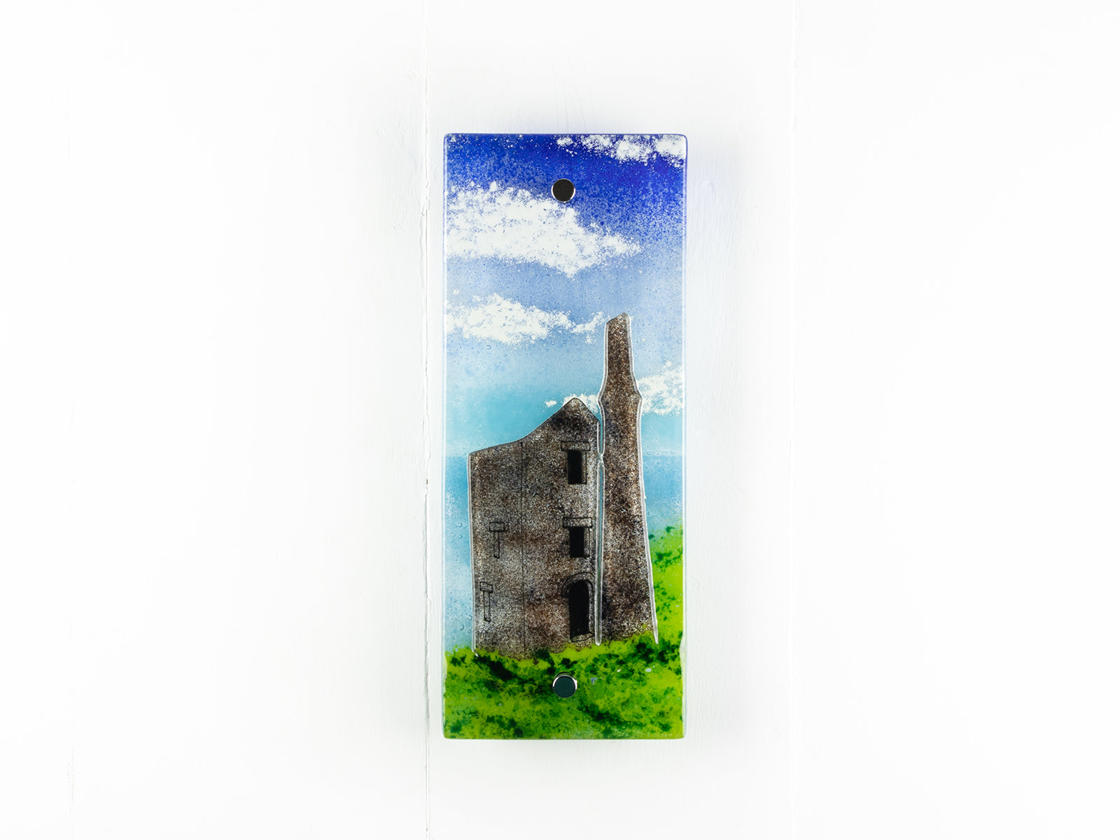 Fused Glass wall panel with a Cornish tin mine design in coastal colours. A hand-made piece of wall art. 