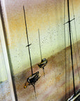 Painted and bubbled detailing on a fused glass triptych depicting a serene harbour scene with hand-painted sailboats on blue water under a pastel sky with hills in the distance. fused glass triptych depicting a serene harbour scene with hand-painted sailboats on blue water under a pastel sky with hills in the distance.