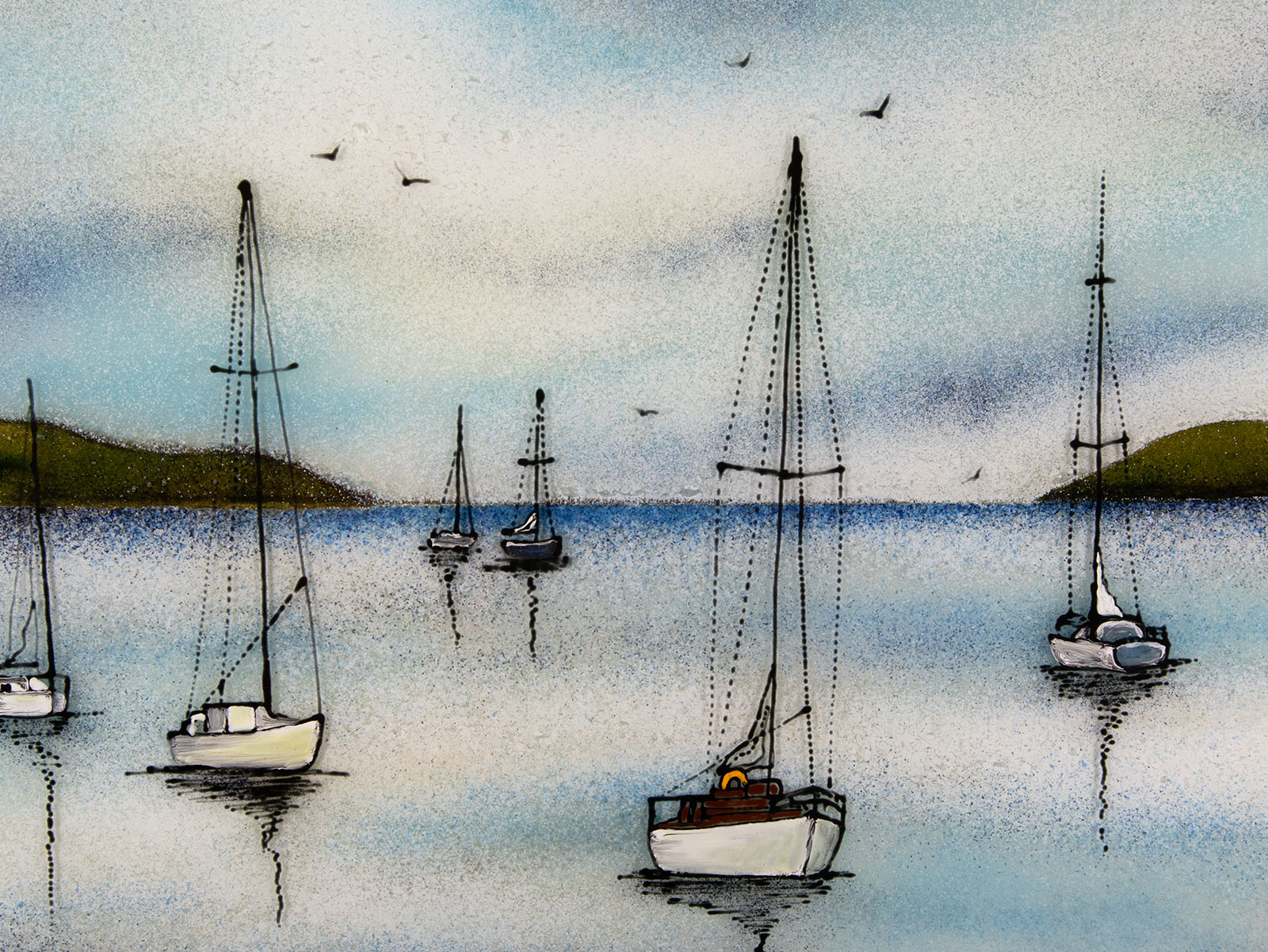 Close up of fused glass art frame featuring hand-painted sailing boats entering a harbour with soaring birds in a soft coastal colour-way. 