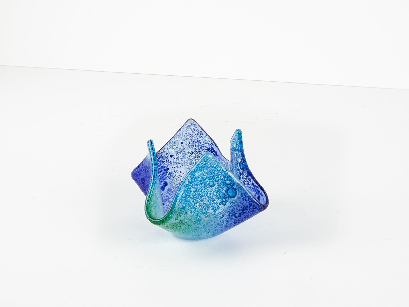 Fused glass fold form vase, handmade in coastal blues and greens. 